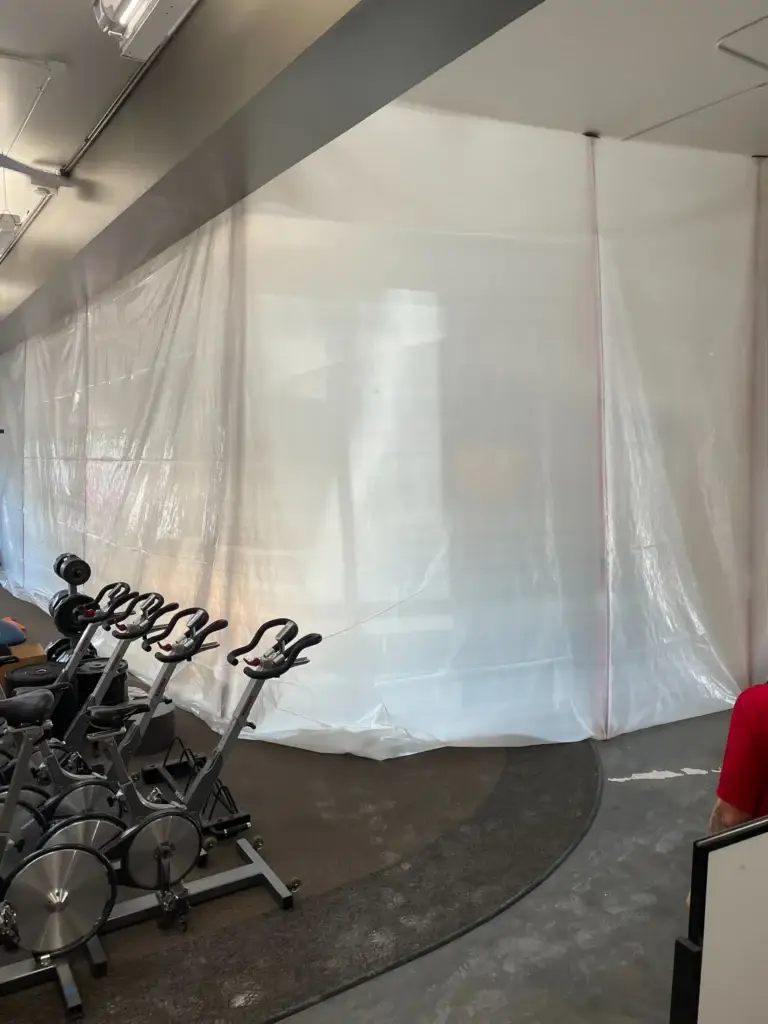 Dust containment barriers set up by Demo Pros to ensure clean, controlled interior demolition in Montana.